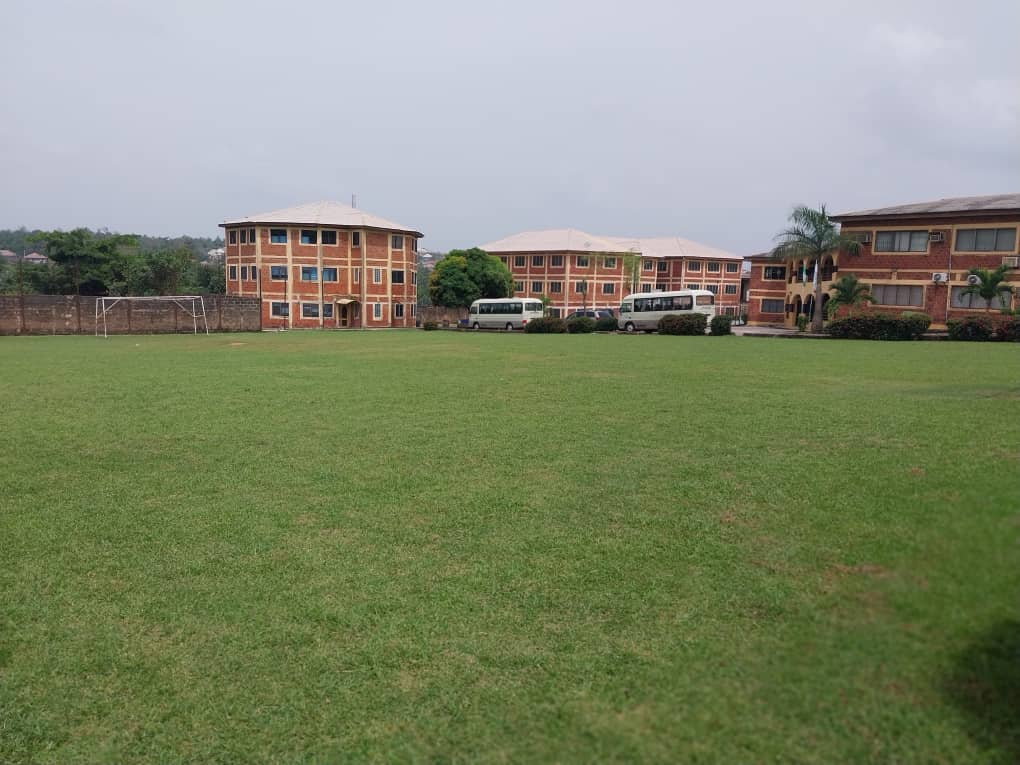 TAAS campus buildings across the school sports field
